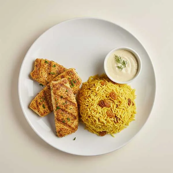 Egyptian Grilled fish with saffron pilaf and Salata Baladi